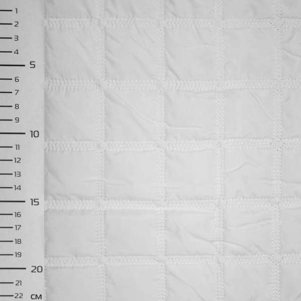 Тканина плащова стьобана матова квадрати 4,5 см біла, ш.145