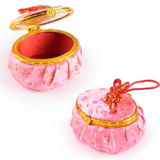 Шкатулка для ювелирных украшений тканевая овальная 9х7х5 см розовая